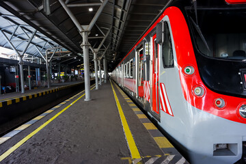 Indonesian train with batik ornament stopped in the station