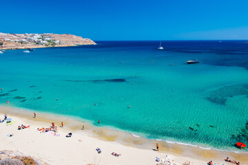 Mykonos, Greece - Paralia Kalo Livadi, a family beach with crystal and shallow water, peaceful and quiet.