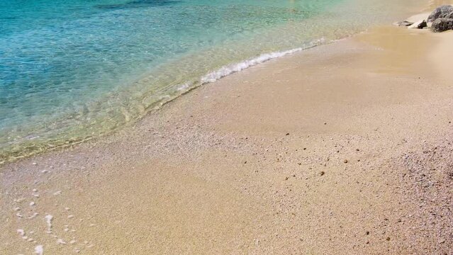 Mykonos, Greece - Paralia Kalo Livadi, a family beach with crystal and shallow water, peaceful and quiet.