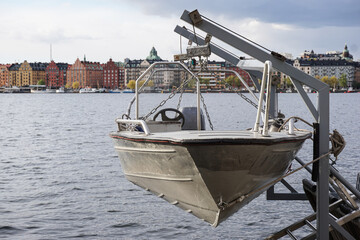 View of a boat hanging over water