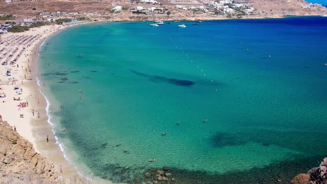 Mykonos, Greece - Paralia Kalo Livadi, a family beach with crystal and shallow water, peaceful and quiet.