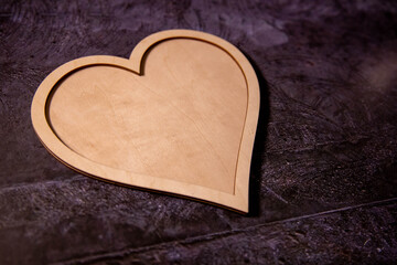 Heart shape wooden tray on white background