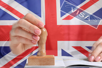 Multiple exposure with woman stamping visa page in passport and flag of Great Britain, closeup