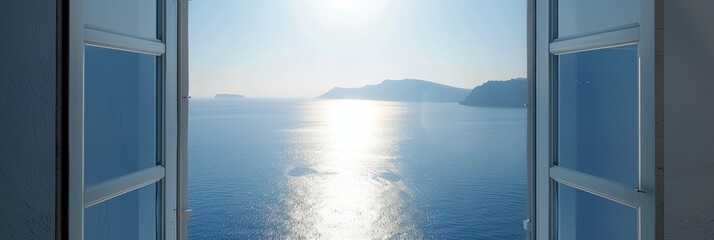 Window overlooking the ocean with the sun shining on the water