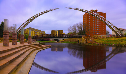 Sioux Falls City Skyline and Big Sioux Riverfront Trail Landscape with water reflections of the...