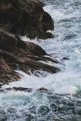 waves breaking on rocks