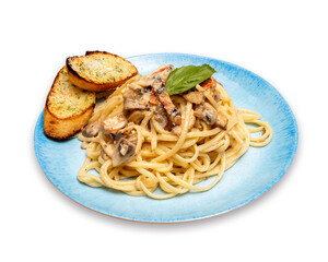 A blue plate of Italian Chicken Alla Vodka Pasta on a white background