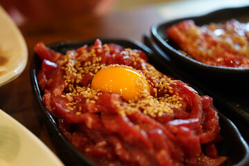 Beef tartare is a traditional Korean dish made by seasoning finely chopped beef without cooking it...