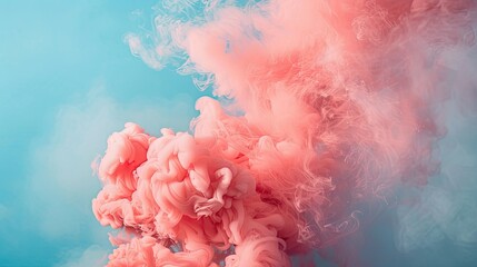 Fototapeta premium Pink smoke billowing from a fire, with a blue sky in the background
