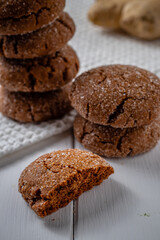 Warm Homemade Gingersnap Cookies on a wooden white board