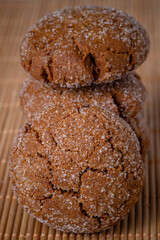 Warm Homemade Gingersnap Cookies on a wooden board