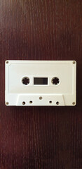 Obraz premium blank white audio cassette tape on table