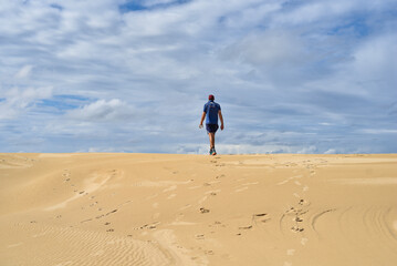 Fototapeta na wymiar Walk through the sand dunes to Tin City