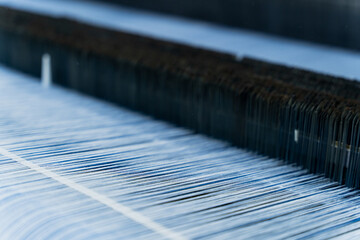 Close-Up of Weaving Machine in Textile Factory

