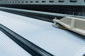 Close-Up of Weaving Machine in Textile Factory

