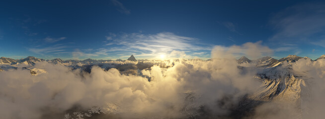 Dramatic Aerial Panorama of Clouds and Mountain Landscape. Nature Background.