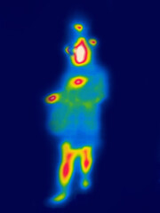 Ufology. A man who believes in aliens (with flying saucers). Image from thermal imager device. Thermal Impressionism