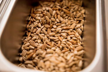 Nuts and dried fruits for making handmade chocolates and candies in a workshop