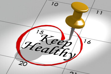 Keep healthy word marked on calendar with push pin