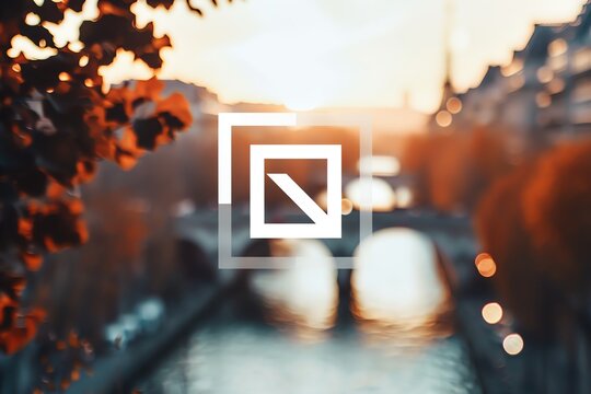 very simple colorful minimalist square white logo overlaying a blurry photo of the outdoors of Scottsdale