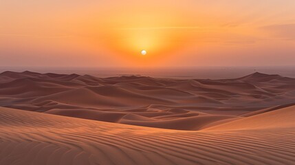 Fototapeta na wymiar The sun sets over the vast desert sands, casting golden hues across the horizon in Dubai, United Arab Emirates.