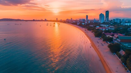 Fototapeta premium Captivating Coastal Cityscape at Sunset with Warm Hues and Tranquil Waters