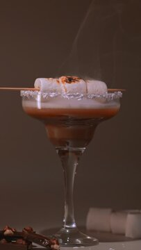 Smoking s'mores cocktail with marshmallow