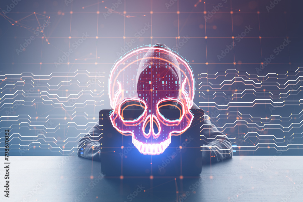 Aufkleber Front viw of hacker at desk using laptop with creative skull and circuit hologram on blurry background. Malware and ransomware concept.