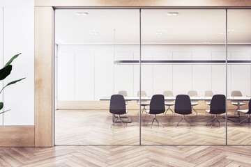 Modern conference room interior with a long table, chairs, and a minimalist design, presented on a...
