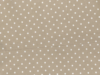 light brown polka dot texture background