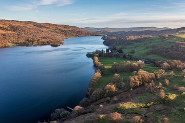 Stunning, Spring sunset landscape aerial drone image in Lake District looking towards Old Man of...
