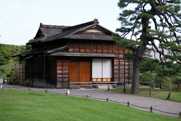 Traditional Japanese chashitsu tea room called Tsubame-no-ochaya or Swallow teahouse along the Shiori-no-ike pond of the Hama-rikyū Gardens