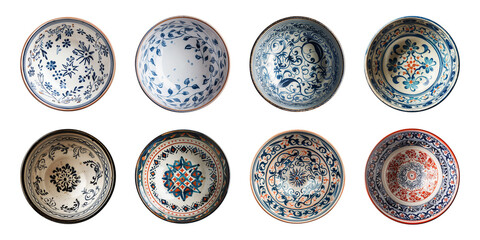 Collection of empty ceramic bowls or plates with a pattern or painted ornament isolated on a transparent background, view from above, cut out, PNG
