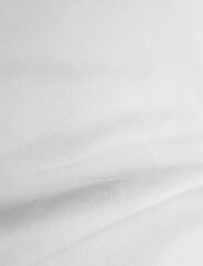 Obraz premium Soft white wrinkled fabric for graphic design or wallpaper