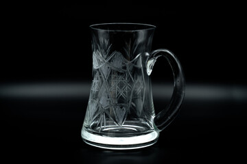 empty crystal beer mug  on black 