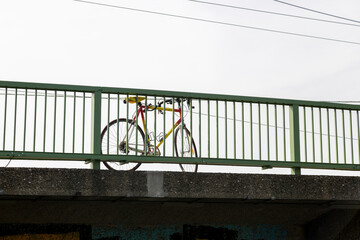 A sports bike near the fence on the road