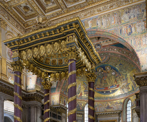 Fototapeta na wymiar The baldacchino, mosaics of triumphal arch and the apse in the Basilica of Saint Mary Major (Santa Maria Maggiore). Rome, Italy