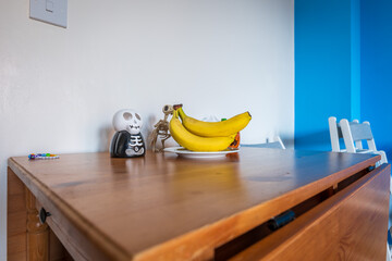 Fresh ripe banana fruit on living room table