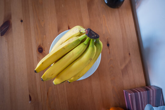 Fresh ripe banana fruit on living room table