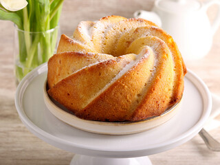 Homemade ring cake with icing sugar