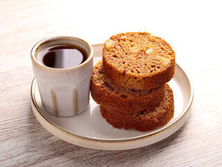 Slices of date and nut roll, with coffee