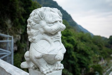 Fototapeta na wymiar Taiwan, Hualien, Taroko, Sand Card Walk, Bridge Pier, Stone Carving Lion,