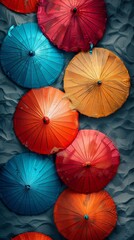 Vibrant Umbrella Patterns Adorning a Sandy Beachscape