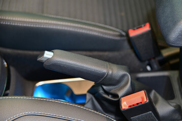 Manual brake in interior of modern car close up - 798741264