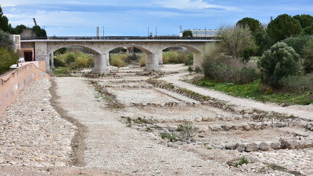 dry river bed of river Serpis in town Gandia in Spain