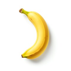 A single banana isolated on a white background, casting a soft shadow, ideal for a minimalist and clean visual representation of the fruit