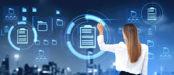 Businesswoman finger touch document management database hologram with files
