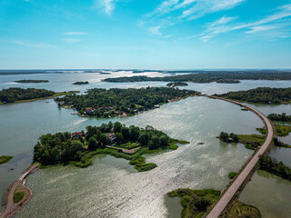 Areal view of a narrow road in the middle of the sea. Åland island, Finnish archipelago