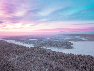 Panoramic view from Levi in Lapland. Pink clouds at sunset. Finland