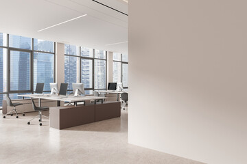 An office interior with desks and computers, modern design, in a high-rise with city views, concept of a professional workplace. 3D Rendering